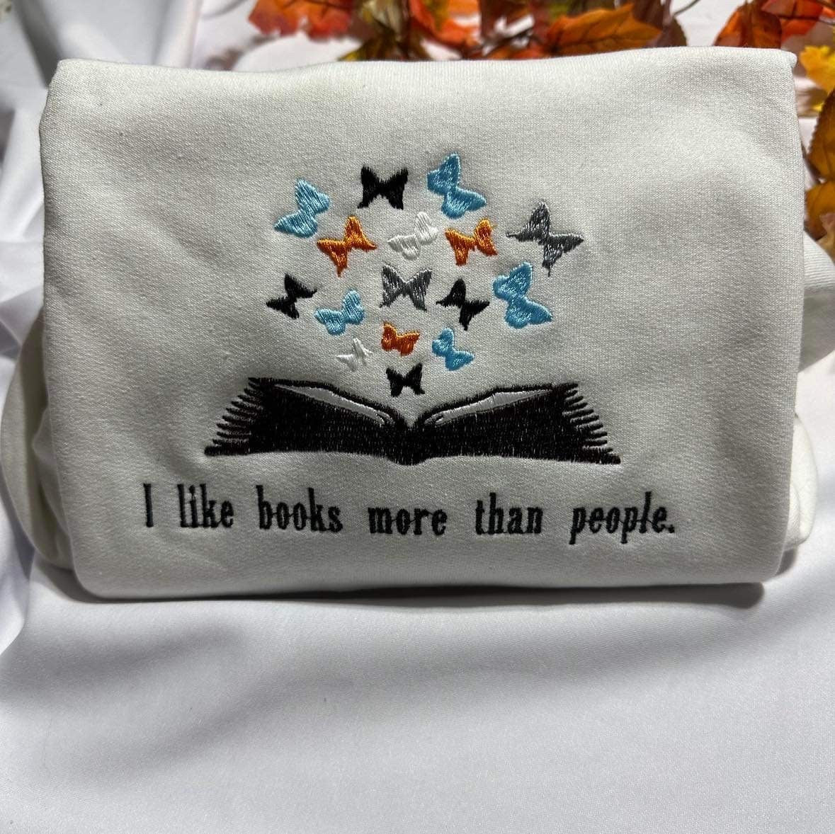 Bookish Embroidered Sweatshirt: Butterfly Book Design, Cozy Book Lover Clothing